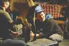 Alaska Travel Industry Association conventioneer Eitan Morse participates in the goat milking contest Wednesday night in Palmer. MATT HICKMAN/Frontiersman