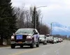 A group of vehicles driven by Sherrod Elementary staff parades through downtown Palmer Friday, May 1, 2020. Tim Rockey.Frontiersman