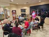 Community members make cards for seniors at the Alaska Veterans and Pioneer Home during an event hosted by Veterans Association of Real Estate Professionals South Central Alaska Chapter. Jaco