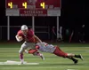 Fourth down and four yards to go during the fourth quarter of Friday’s game, Wasilla’s Cash McGregor tries for a first down against West Valley’s Elijah Connell. ROBERT DeBERRY/Frontiersman.c