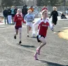 Wasilla senior Kendra Nelson leads a group of runners around a
turn Wednesday during a tri-meet hosted by Wasilla High School.
(Jeremiah Bartz/Frontiersman)