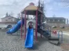 A children’s play set sits empty on a cloudy day in Anchorage. Advocates say better access to educational resources might help parents and children engage with their communities.  Sophia Carl