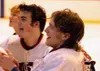 James Hundley and Wade Williams celebrate after Houston won the
3A state hockey title with a 9-5 win over Delta. Photo by JEREMIAH
BARTZ/ Frontiersman.
