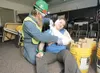 ROBERT DeBERRY/Frontiersman Joanna Hansen acts the part of an
injured earthquake survivor as student Bruce Paulsen puts her arm
in a sling during a Community Emergency Response Team training
