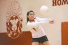 ROBERT DeBERRY/Frontiersman Wasilla sophomore Sariah Tuisaula
keeps the ball in play during a match against the West Valley
Wolfpack on Thursday at Wasilla High School.