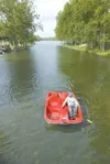 ROBERT DeBERRY/Frontiersman Riley Swanson, a 5th generation
Kepler, makes his rounds on a paddle boat Saturday at
Kepler-Bradley lakes in Palmer.
