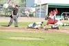 ROBERT DeBERRY/Frontiersman Mat-Su’s Carl Uhl stretches to touch
home plate before getting tagged during the first inning of the
Miners’ 1-0 win over the Peninsula Oilers Thursday at Hermon
B
