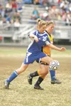 Soccer Palmer Shawna Thein ROBERT DeBERRY/Frontiersman Palmer's
Shawna Thein takes control of the ball during Saturday's region
championship game against the Homer Mariners at Wasilla High
Sc