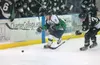 Alaska Avalanche forward Evan Hesse moves the puck down the ice as Fresno Monster Brett Blomgren gives chase during Alaska's win over the Monsters Friday evening at the MTA Events Center in P