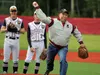 Jason Ryan throws out the ceremonial first pitch prior to the first game of the annual Todd Ryan Memorial Thursday at Wasilla High School. Jason Ryan's older brother Todd was a former Wasilla