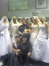 Submitted photo Pictured are Diane and Ron Tresham, Mrs. Alaska
International Marlene Stephens. Surrounding them are models wearing
formal wedding gowns, including Diane Tresham’s 50-year-old