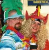Many of the passengers on the murder mystery came dressed in
Hawaiian wear, as part of the theme of the day-long ride from
Wasilla to Hurricane Gulch and back. Photo by Joel
Davidson/Frontier