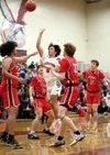 Houston's Hayden Howard goes to the basket during a win over Kenai. Bruce Eggleston/matsusports.net