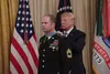 President Donald J. Trump presents the Medal of Honor to U.S. Army Master Sgt. Matthew O. Williams during a ceremony at the White House in Washington, D.C., Oct. 30, 2019. Williams was awarde
