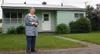 CASEY RESSLER/Frontiersman Willie Pedersen stands outside of her
house on South Bailey Street in Palmer. Pedersen is the last
original owner a house that was built during the first Alaska Rur