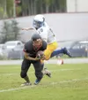 Houston receiver Jake Wells hauls in a catch during a loss to
Kodiak early in the season. Wells leads the Hawks with 12 catches
this year. ROBERT DEBERRY/ Frontiersman Robert DeBerry