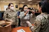 Staff Sgt. Kleo Edgell, 60th Logistics Readiness Squadron aircraft parts store supervisor, left, and Tech. Sgt. Erica Dixon, 60th LRS noncommissioned officer in charge of the aircraft parts s