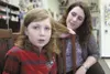 HEATHER A. RESZ/Frontiersman Mom Lisa Shield plays with son
Terren’s long hair before he donated it to Locks of Love
Tuesday.