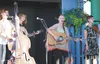 The Redhead Express performs Friday evening at the Bluebonnet Stage at the Alaska State Fairgrounds in Palmer. From left, is Meghan Walker, with sisters LaRae, Kendra and Alisha. (MATT HICKMA