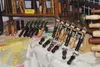 The ice cream scoops, potato peelers and salt and pepper shakers designed by Wasilla woodturner David Stacheli on display at the Alaska State Fairgounds on Saturday for day one of the Holiday