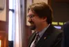 Sen. Rob Myers, R-North Pole, smiles while talking to another senator on Monday, May 16, 2022, in the Alaska Senate at Juneau, Alaska. James Brooks/Alaska Beacon