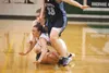 Colony’s Ashley Turcotte gets tangled up with Soldotna Stars Katelynn Kerkuliet and Haley Miller during the semifinals of the Northern Lights Conference Championships Friday at Colony High Sc