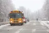 A school bus makes a stop along Wasilla-Fishook Road to let
children off. If schools are closed the district will issue a
“ConnectEd” message to all families through its automated
notificatio