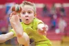 Machetanz Elementary School student Hunter Hayes connects with the ball during Saturday’s one-foot high kick event at the elementary Junior Native Youth Olympics competition at Wasilla High S