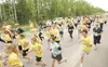 ROBERT DeBERRY/Frontiersman Runners race off the starting line
along Spruce Avenue during the fourth annual Curtis C. Menard II 5K
Memorial Run Saturday. About 400 runners were in attendance.