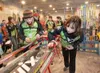 2008 Colony cross country ski team members Ellen VanGorder,
left, and Abby Jahn work on the base of their skis before the start
of that year’s Alaska State Cross Country Ski Championships at
