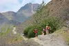 Hikers step aside to make way for a runner coming the opposite direction on the Crow Pass Trail in this 2016 Frontiersman file photo. The 2017 Crow Pass Crossing has been suspended. Frontiers