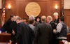Speaker of the House Cathy Tilton, R-Wasilla, is surrounded by other members of the Alaska House of Representatives on Wednesday, April 5, 2023. Members of the House minority staged an hours-