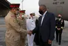 Secretary of Defense Lloyd J. Austin III is greets Bahraini military officlas after arriving in Bahrain, Nov. 19, 2021. Secretary Austin is visiting the Kingdom of Bahrain to deliver remarks 