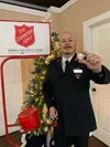 Kevin Bottjen holds up a rare coin that was dropped in a Red Kettle by an anonymous donor. Courtesy photo