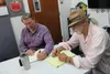 Mat-Su Opioid Task Force founding members, Michael Carson (right) and John Green discuss ideas and projects for the local recovery community at MyHouse in downtown Wasilla. Frontiersman file 