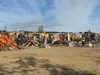 Big Lake and Meadow Lakes area residents help clear debris from a July 4 fire that devastated the 3,800-square-foot dream home of Troy and Lieba Putnam in Big Lake on July 25. More than 60 ad