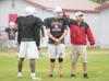 Wasilla Warrior head coach Glenn Nelson explains drills during a
practice at Wasilla High School Last week. ROBERT
DeBERRY/Frontiersman