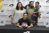 Palmer High School senior Jared Oviok poses with his family after signing his National Letter of Intent to play football at the University of Minnesota Morris. JEREMIAH BARTZ/ Frontiersman