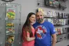 Owners Luis and Amie Jo Nieves stand near vintage comics in their new shop, Jacob Mann Frontiersman.com