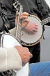 Frontiersman File photo Banjo pickin’ is a staple for musicians
and spectators at the Talkeetna Bluegrass and Music Festival, which
begins this weekend.