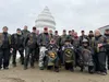 Members of the Combat Veterans Association pose for a group shot after stopping at Miller's Market in Houston for ice cream. It's all part of their annual last ride of the season called the F