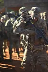 U.S. Army Soldiers assigned to 198th Infantry Battalion conduct squad room clearing procedures during the Military Operating Urban Terrain Training (MOUT) portion of infantry One Station Unit