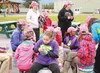 Girl Scouts from the Chugiak-Eagle River troop weave plastic baskets at the 2015 Encampment event at the Alaska State Fairgrounds this weekend. About 750 Girl Scouts from around Alaska attend
