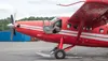 Upgrade to a turbine, with flaps down and the pilot's door open during taxi, K2 Aviation's Twin Otter is a former Vietnam Warm Army light cargo &amp; transport aircraft. J. David McChesney/Fr