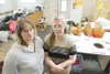 ROBERT DeBERRY/Frontiersman Bishop's Attic assistant manager
Jessie Becker, left, and manager Ann Cockrell stand inside the back
sorting area of the store where thieves gained entrance someti
