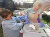 Peter Isackson and Aila Berrigan work on a tie-dye project during the Birchtree Charter School Fall Faire Sept. 25. Photo courtesy Birchtree Charter
