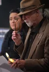 Michael Carson reads some of the names of local lives lost to addiction during the seventh annual candlelight vigil in 2024. J. David McChesney/Frontiersman