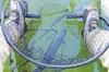 A fish swims in net in green lake water. Courtesy Ehmann Outdoors