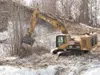 Heavy equipment from Alaska Hydro Axe clears trees and brush Thursday afternoon for Phase II of the Trunk Road Project Robert DeBerry