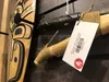 Artwork for sale at the Sealaska Heritage Institute shop on Friday, June 16, 2023, bears a label declaring it compliant with the Indian Arts and Crafts Act. The federal government has filed s
